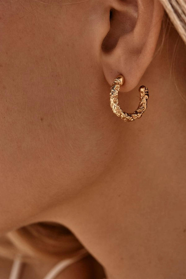 Tubac Earrings by Amber Sceats - textured gold hoop earrings with polished finish, designed for effortless everyday styling.