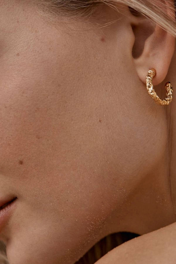 Tubac Earrings by Amber Sceats - textured gold hoop earrings with polished finish, designed for effortless everyday styling.