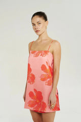 Tunic Top Peach Petals by Your Brand, a breezy mini slip top in peach with bold florals. Perfect for beach layering or summer days.
