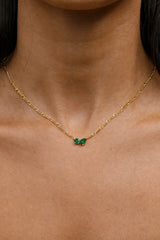 Twin Flame Necklace Emerald by Avant Studio – 18k gold plated sterling silver necklace with emerald cubic zirconia pendant.