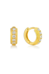 Ulrika Huggies Gold by Avant Studio, mini gold hoops with round-cut zirconias for light-catching sparkle. Perfect for everyday luxe.