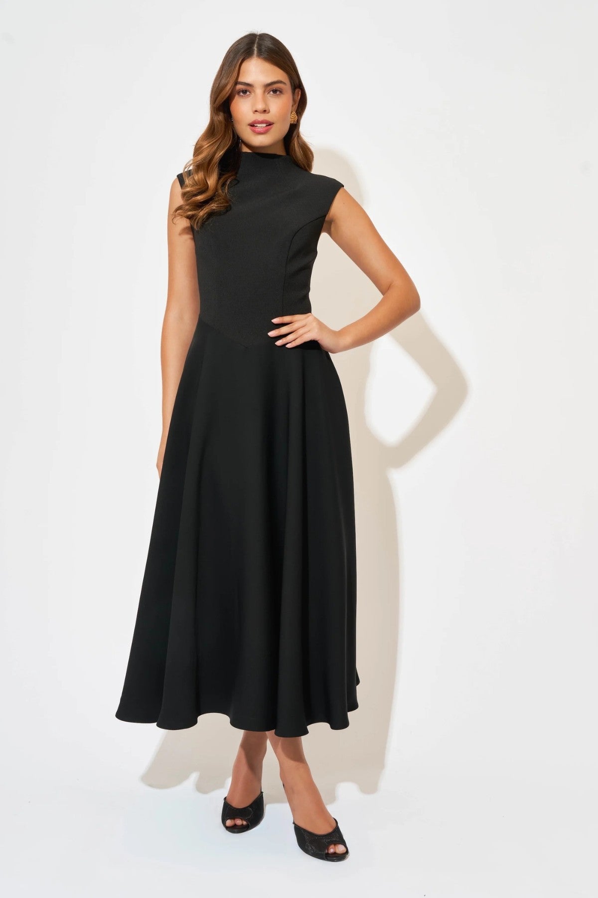 Ultimate Muse High Waist Sleeveless Midi Dress by Odd Muse — a black fitted midi with a signature V-waistline, perfect for elegant evenings.