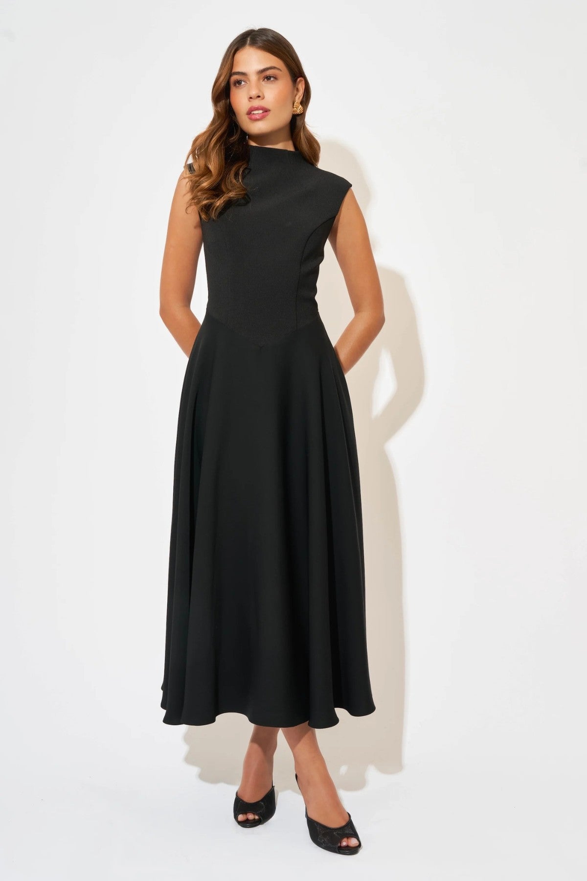 Ultimate Muse High Waist Sleeveless Midi Dress by Odd Muse — a black fitted midi with a signature V-waistline, perfect for elegant evenings.