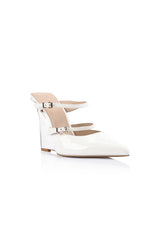 VGwen Wedge in Lucite & White Leather by Lana Wilkinson, a pointed-toe mule with adjustable strap and green lucite wedge heel.