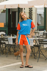 Vacation Top French Blue by Araminta James, cotton fleece tee with retro 70’s graphic and crew neckline, a trendy sporty-chic piece perfect for casual days.