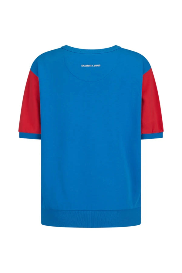 Vacation Top French Blue by Araminta James, cotton fleece tee with retro 70’s graphic and crew neckline, a trendy sporty-chic piece perfect for casual days.