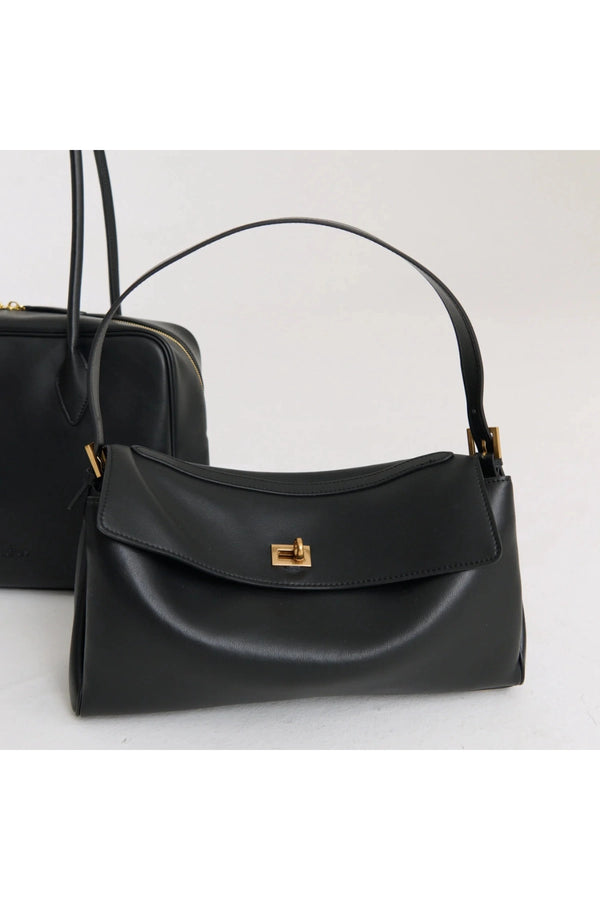 Valentina Bag Black by Reh Studios – a structured leather bag with adjustable strap and dual compartments. Perfect for everyday wear.