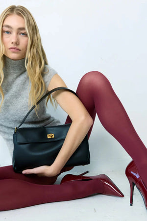 Valentina Bag Black by Reh Studios – a structured leather bag with adjustable strap and dual compartments. Perfect for everyday wear.