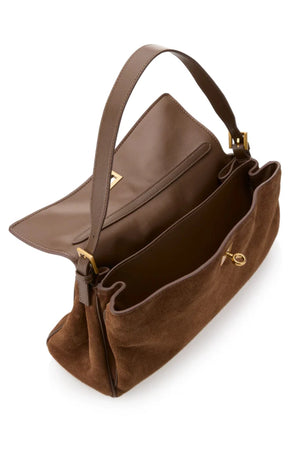 Valentina Bag Suede by Reh Studios – a structured suede and leather bag with adjustable strap. Perfect for chic everyday wear.