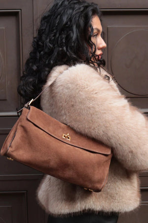 Valentina Bag Suede by Reh Studios – a structured suede and leather bag with adjustable strap. Perfect for chic everyday wear.