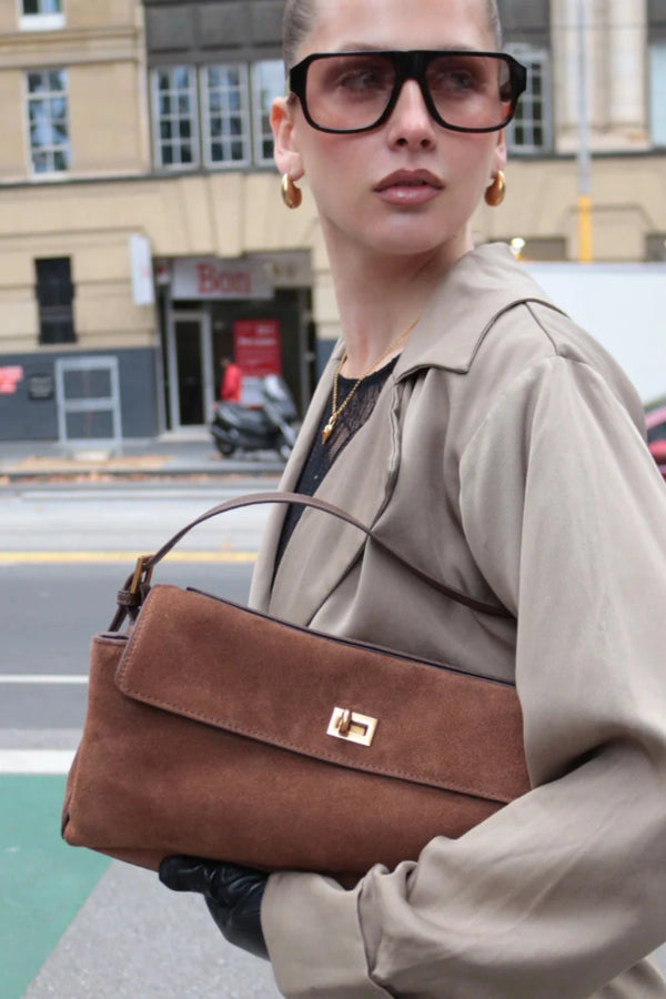 Valentina Bag Suede by Reh Studios – a structured suede and leather bag with adjustable strap. Perfect for chic everyday wear.