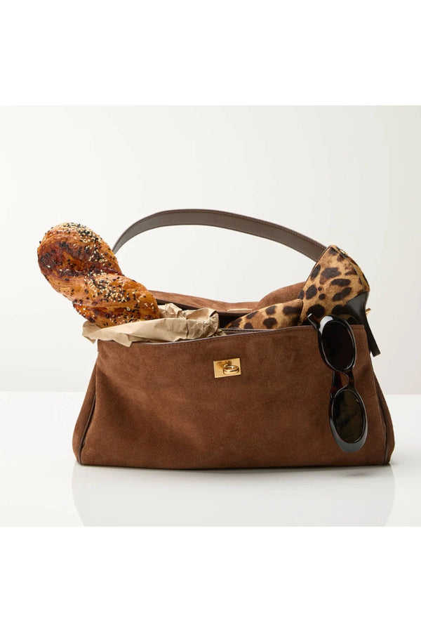 Valentina Bag Suede by Reh Studios – a structured suede and leather bag with adjustable strap. Perfect for chic everyday wear.