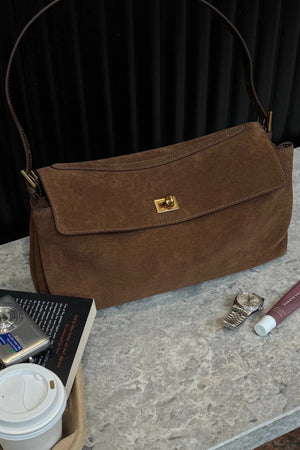 Valentina Bag Suede by Reh Studios – a structured suede and leather bag with adjustable strap. Perfect for chic everyday wear.