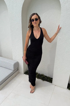 Valentina Midi Dress Black by Sneaky Link – a fitted midi with plunge neckline and draped skirt. Perfect for evening styling.