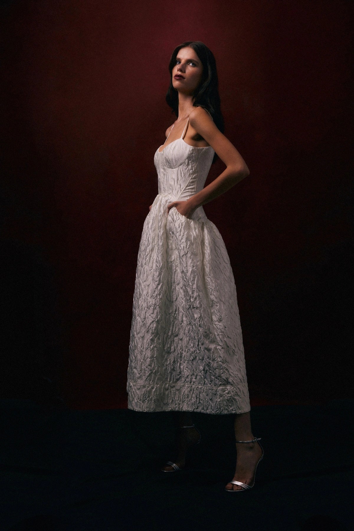 Vanilla Dreams Midi Dress Ivory by Rebecca Vallance – elegant ivory jacquard corset midi with adjustable straps and voluminous skirt.
