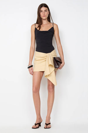 Vara Mini Skirt Sandstorm by Bec and Bridge, a V-waist suiting mini with soft front drape for modern, polished styling.