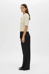 Vega Knit Top by Camilla and Marc, a stone grey short sleeve knit cardigan with ribbed neckline and button front.