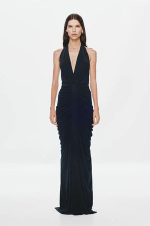Venus Gathered Cupro Maxi Dress by Misha, a black plunging halter gown with ruched draping and mermaid hem. Perfect for formal events.
