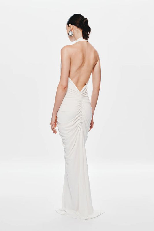 Venus Gathered Cupro Maxi Dress by Misha, a plunging halter style with ruched draping and mermaid hem. Perfect for elegant evenings.