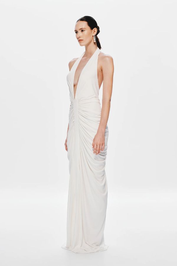 Venus Gathered Cupro Maxi Dress by Misha, a plunging halter style with ruched draping and mermaid hem. Perfect for elegant evenings.
