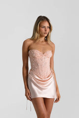 Verity Bustier in Baby Pink by Natalie Rolt, a strapless corset bodysuit with lace-up back and boning. Perfect for elevated formal looks.