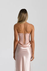 Verity Bustier in Baby Pink by Natalie Rolt, a strapless corset bodysuit with lace-up back and boning. Perfect for elevated formal looks.