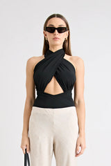 Victoria Top Black by Pfeiffer, sculpting wrap-style jersey top with double lining and adjustable ties for a sleek, curve-enhancing fit.