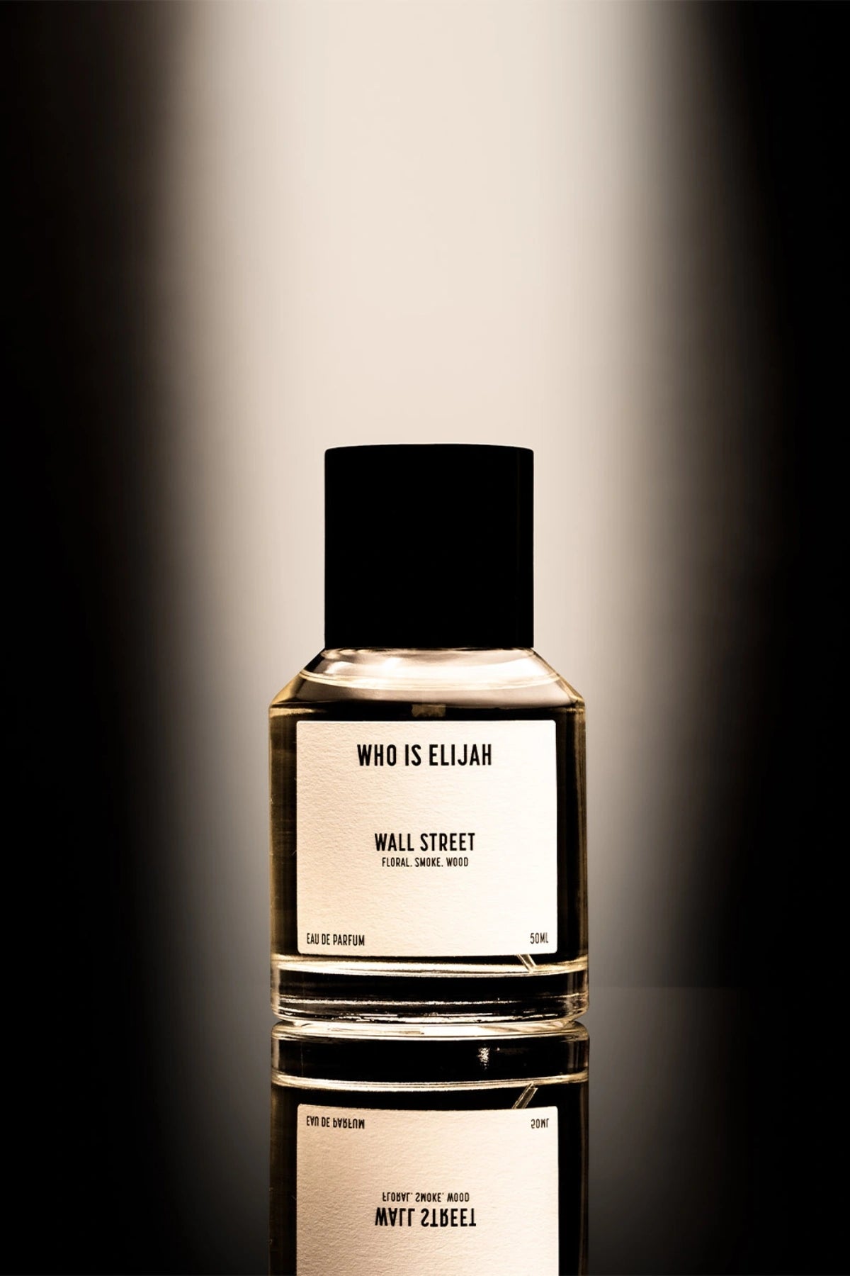 Wall Street by Who Is Elijah, a floral, smoky, and woody fragrance with rose, raspberry, oud wood, incense, saffron, amberwood, benzoin, and leather.