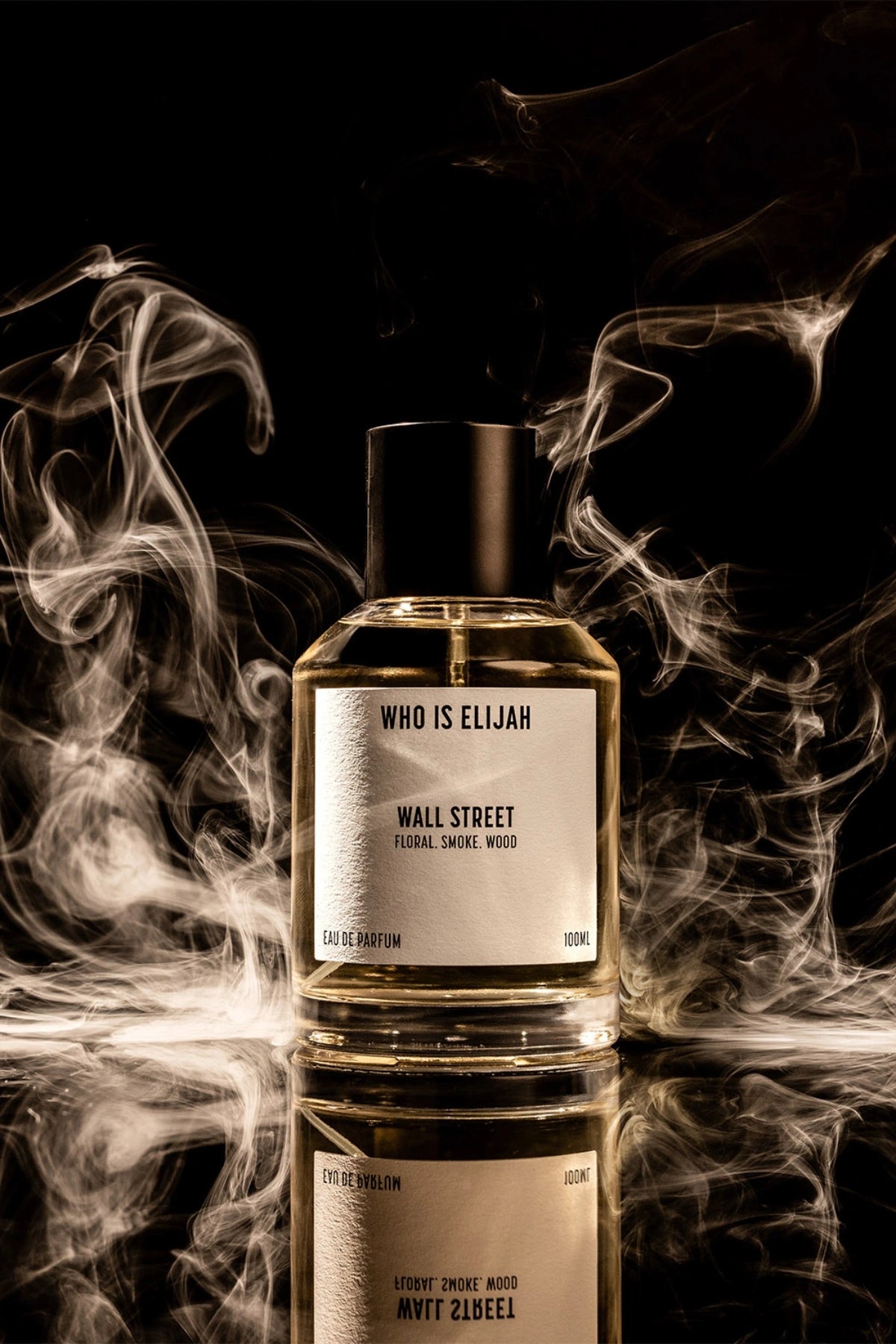 Wall Street by Who Is Elijah, a smoky, woody floral fragrance with rose, raspberry, Egyptian geranium, oud, incense, saffron, amberwood, and leather.