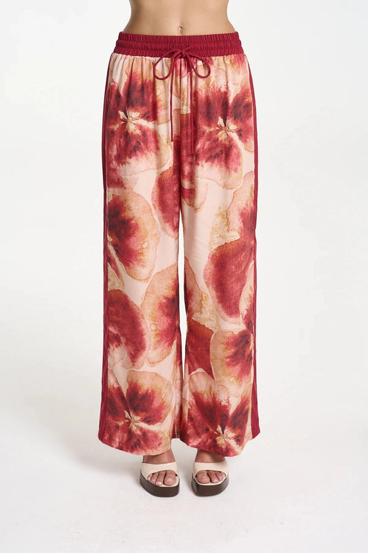 Wide Leg Pant by Summi Summi — a tencel pant with a hand-painted Aloha print and relaxed fit, perfect for breezy everyday styling.