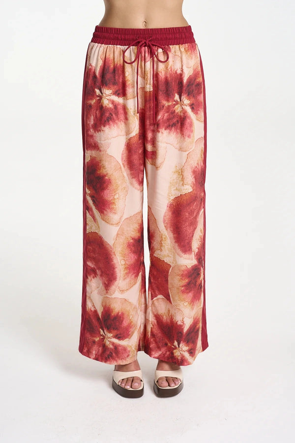 Wide Leg Pant by Summi Summi — a tencel pant with a hand-painted Aloha print and relaxed fit, perfect for breezy everyday styling.