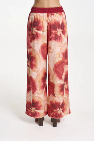 Wide Leg Pant by Summi Summi — a tencel pant with a hand-painted Aloha print and relaxed fit, perfect for breezy everyday styling.