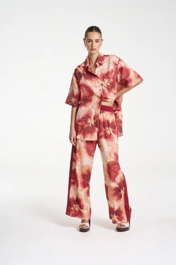 Wide Leg Pant by Summi Summi — a tencel pant with a hand-painted Aloha print and relaxed fit, perfect for breezy everyday styling.