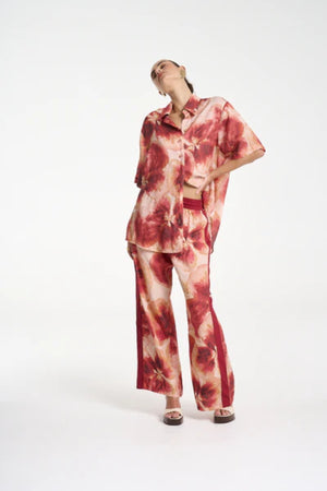 Wide Leg Pant by Summi Summi — a tencel pant with a hand-painted Aloha print and relaxed fit, perfect for breezy everyday styling.