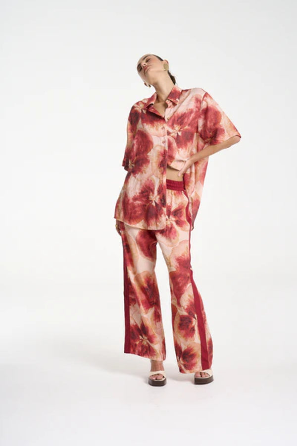 Wide Leg Pant by Summi Summi — a tencel pant with a hand-painted Aloha print and relaxed fit, perfect for breezy everyday styling.