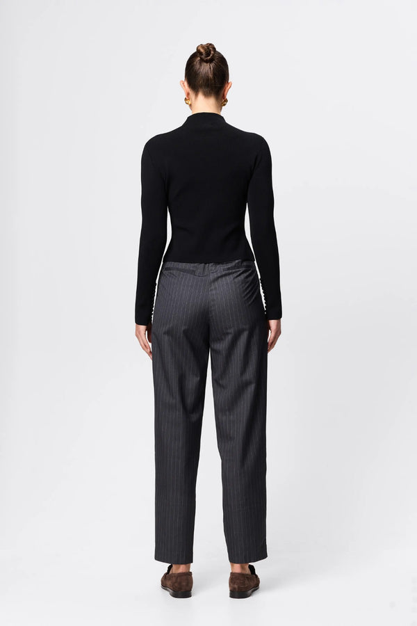 Windsor Knit Top Black by Mossman - slim fit knit top with extended neckline and button detail, designed for a refined modern silhouette.