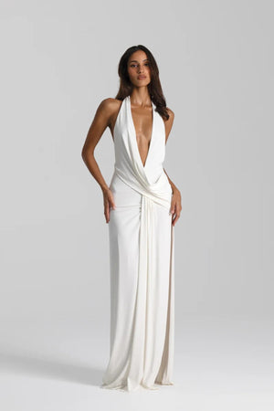 Winona Gown White by Natalie Rolt – a draped halter gown with open back and side split. Perfect for formal evening events.