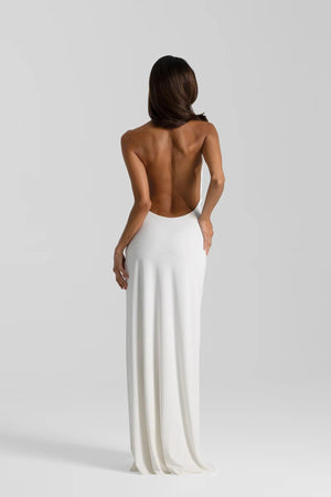 Winona Gown White by Natalie Rolt – a draped halter gown with open back and side split. Perfect for formal evening events.