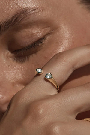 With Every Breath Ring by By Charlotte, 18k gold vermeil open band ring with pear and heart cut cubic zirconia stones.