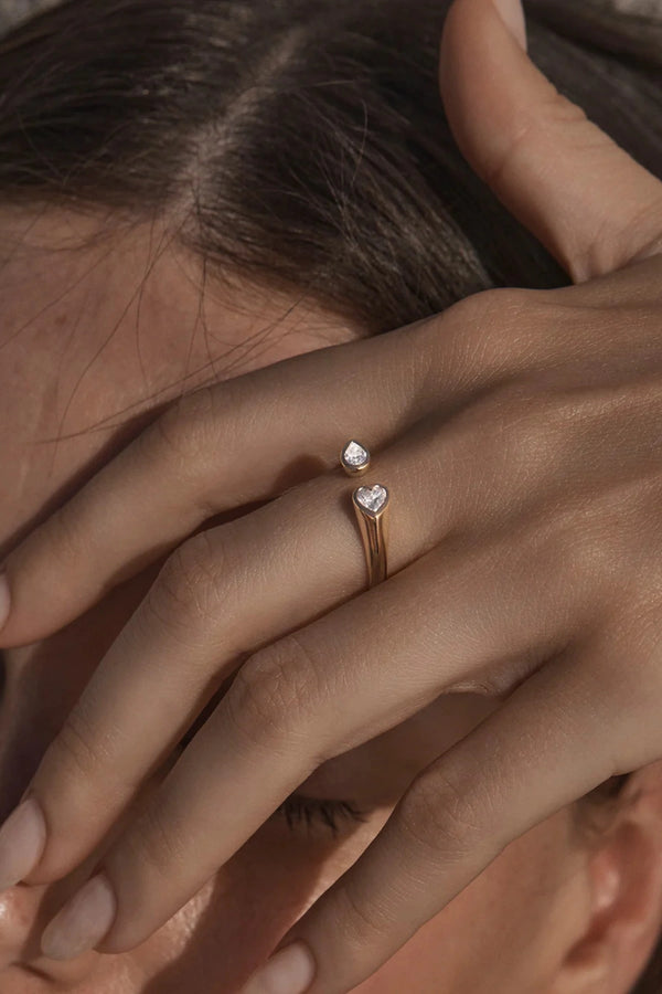 With Every Breath Ring by By Charlotte, 18k gold vermeil open band ring with pear and heart cut cubic zirconia stones.