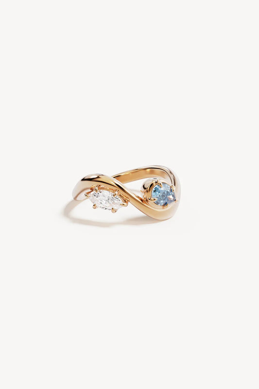 With Freedom I Become Ring by By Charlotte – 18k gold vermeil ring with aquamarine and cubic zirconia stones.