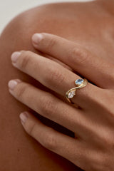 With Freedom I Become Ring by By Charlotte – 18k gold vermeil ring with aquamarine and cubic zirconia stones.