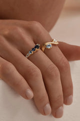 With Freedom I Become Ring by By Charlotte – 18k gold vermeil ring with aquamarine and cubic zirconia stones.