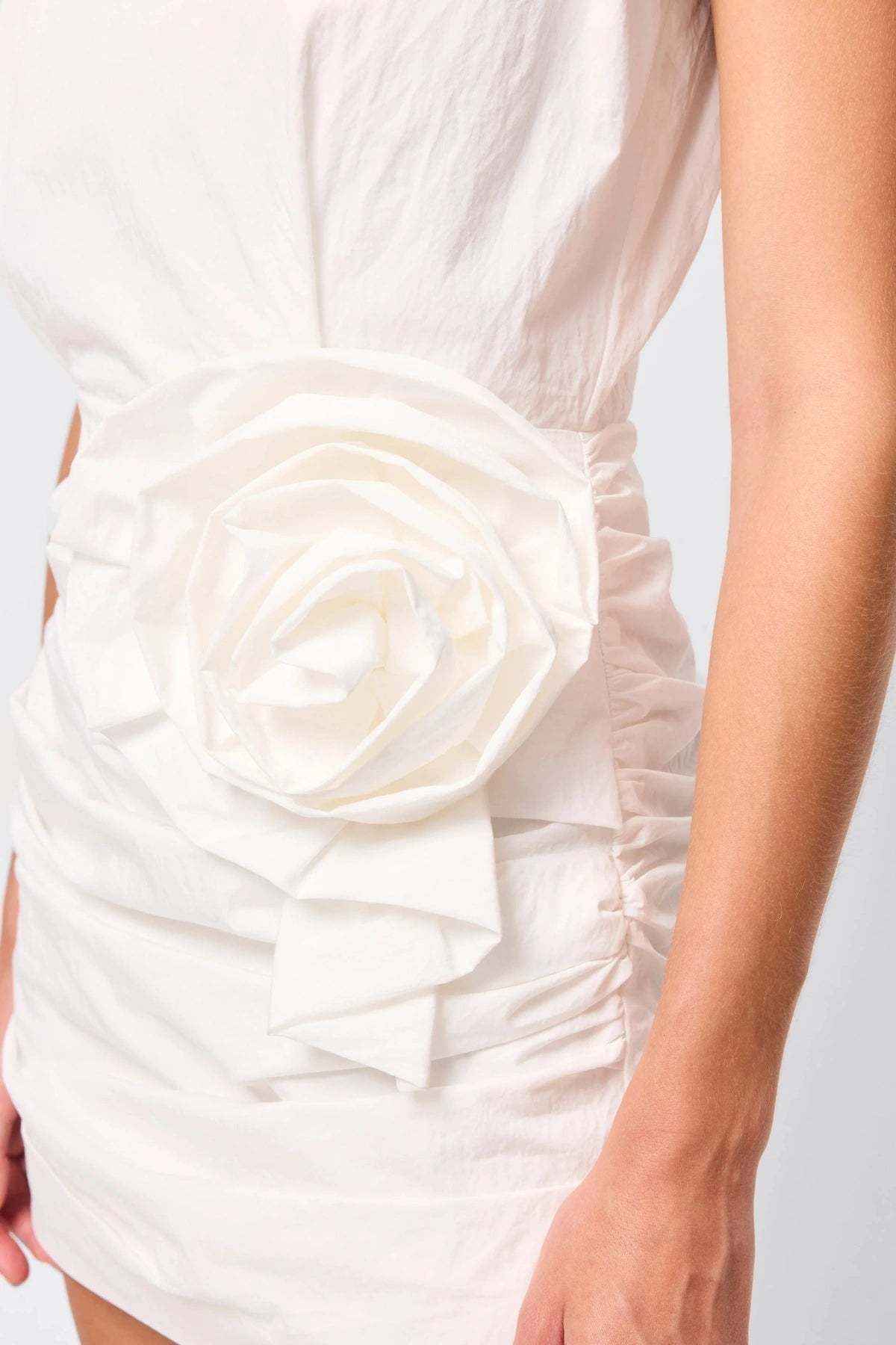 Wrapped In You Mini Dress White by Mossman, ruched mini with shoulder pads and rosette detail, a trendy piece perfect for bold evenings or events.