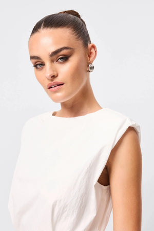 Wrapped In You Mini Dress White by Mossman, ruched mini with shoulder pads and rosette detail, a trendy piece perfect for bold evenings or events.