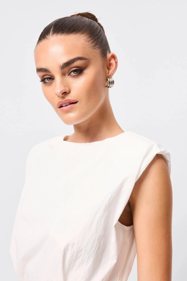 Wrapped In You Mini Dress White by Mossman, ruched mini with shoulder pads and rosette detail, a trendy piece perfect for bold evenings or events.