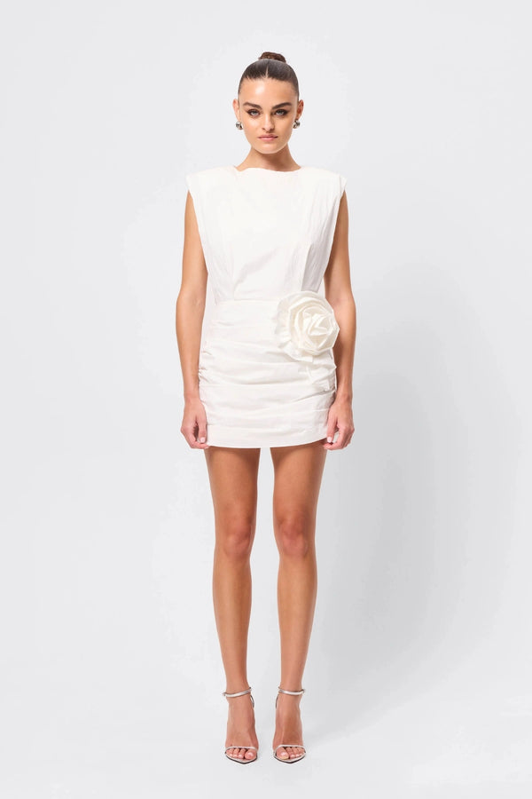 Wrapped In You Mini Dress White by Mossman, ruched mini with shoulder pads and rosette detail, a trendy piece perfect for bold evenings or events.