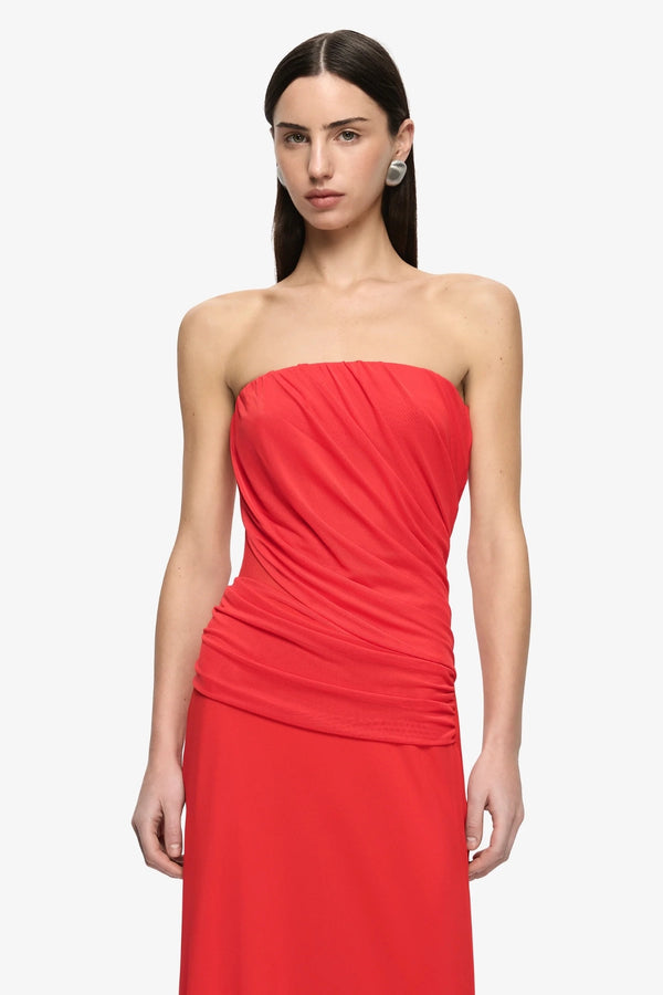 Xanthi Strapless Maxi Dress Flame by Bec + Bridge – strapless draped maxi dress with gathered bodice and drop waist silhouette.