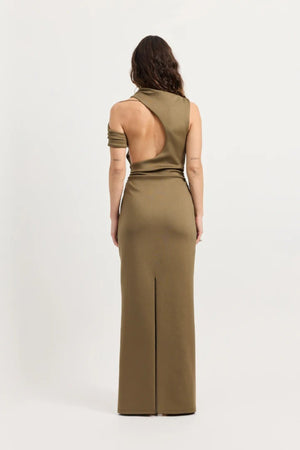 Xyla Dress by Tojhà – a clay jersey maxi with an asymmetric neckline, wrapped arm detail, and soft tucks, perfect for modern evening styling.