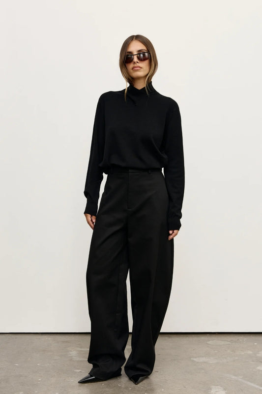 Yvette Knit Jumper Black by Bayse – relaxed fine knit jumper with crossover high neckline and dropped shoulders.